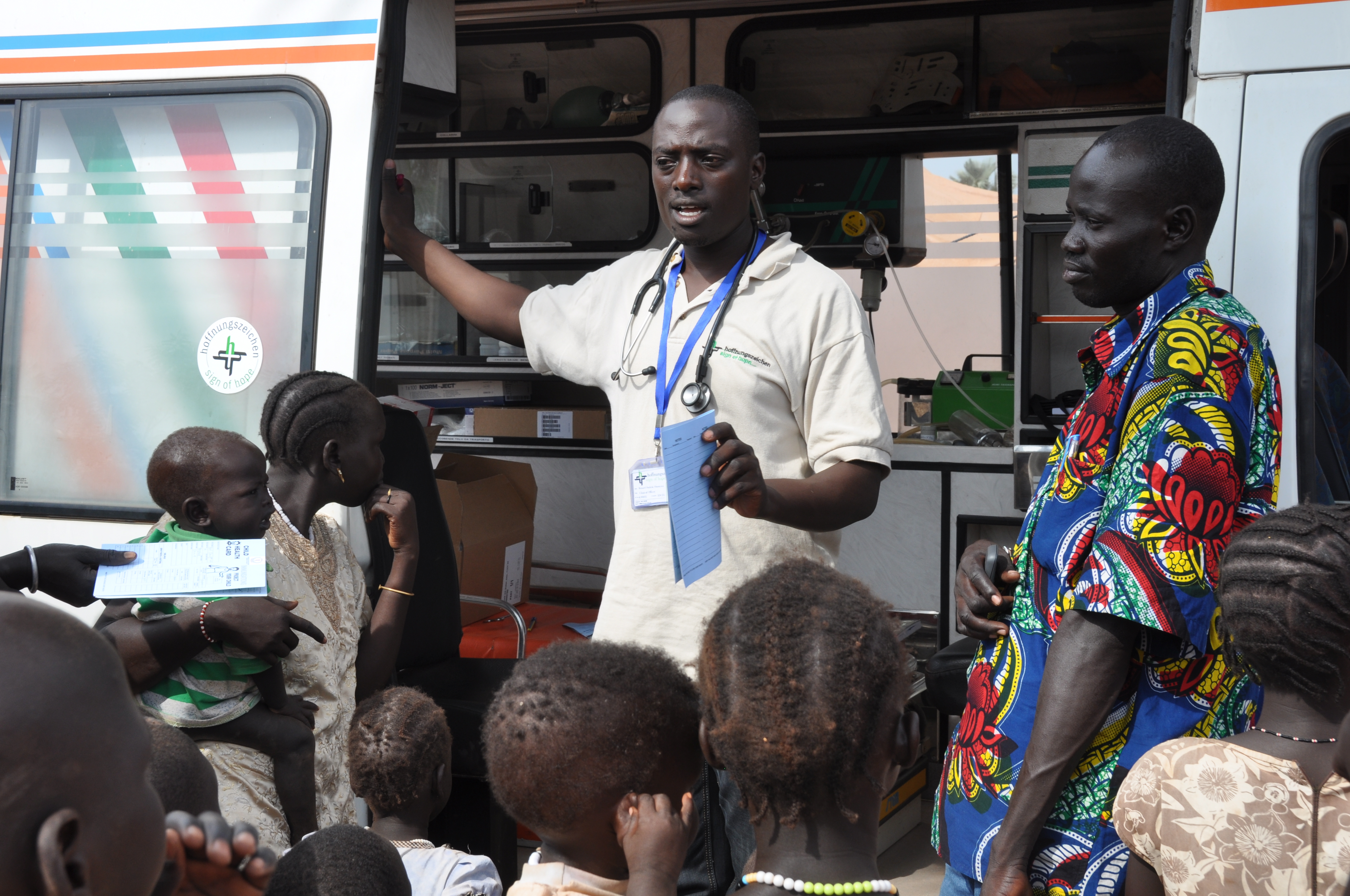 A clinical staff member of Sign of Hope educates patients about disease prevention measures. A clinical staff member of Sign of Hope educates patients about disease prevention measures.